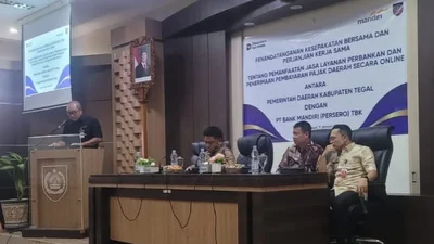 Pemerintah Kabupaten Tegal dan PT Bank Mandiri (Persero) Tbk menandatangani Kesepakatan Bersama (MoU) dan Perjanjian Kerja Sama (PKS) tentang Pemanfaatan Jasa Pelayanan dan Penyediaan Layanan Perbankan dalam Rangka Pembayaran Pajak Daerah secara Online pada Jumat,9 Januari 2026.