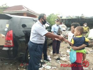 Kantor Pelabuhan Pekalongan Bagikan 2000 Nasi Ikan